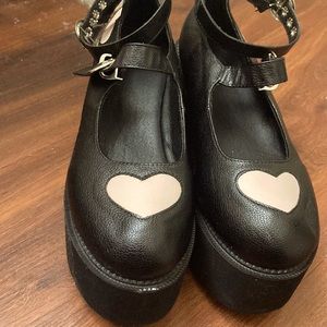 cute black boots, pink hearts on the front